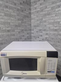 Микроволновая печь Midea EM720CKE Микроволновая печь Midea EM720CKE